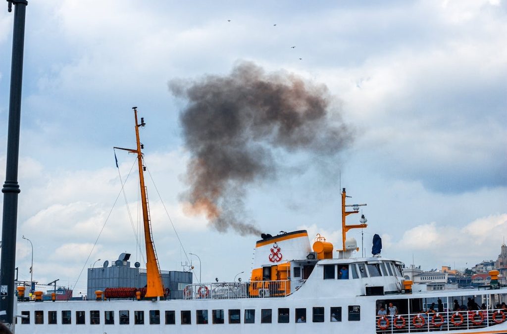 smoke blowing from a ships chimney